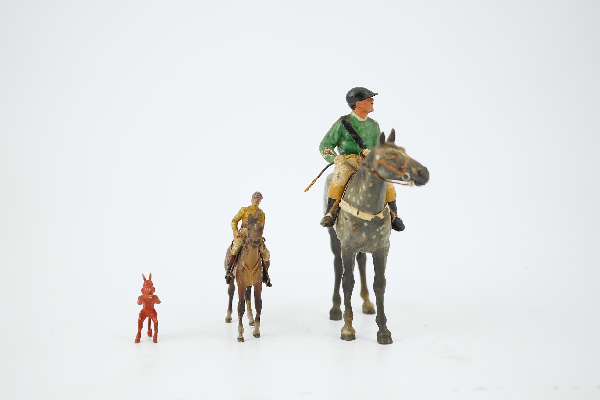 Two Austrian cold-painted bronze figures groups of jockeys on racehorses, early 20th century